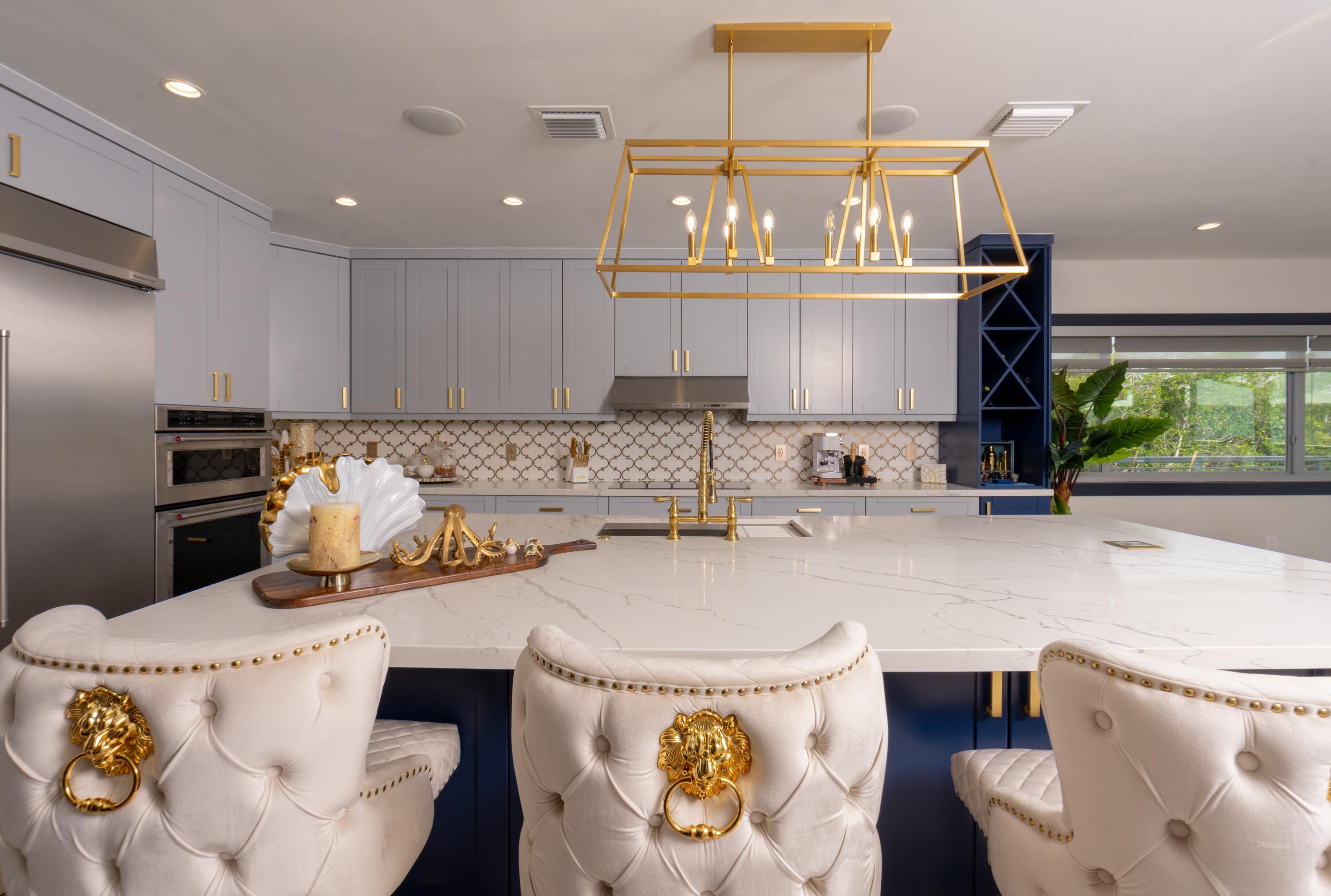 475 Bahia Honda Road Key Largo, FL 33037 - Photo 83 of 134 a kitchen with stainless steel appliances granite countertop a sink a stove and a refrigerator