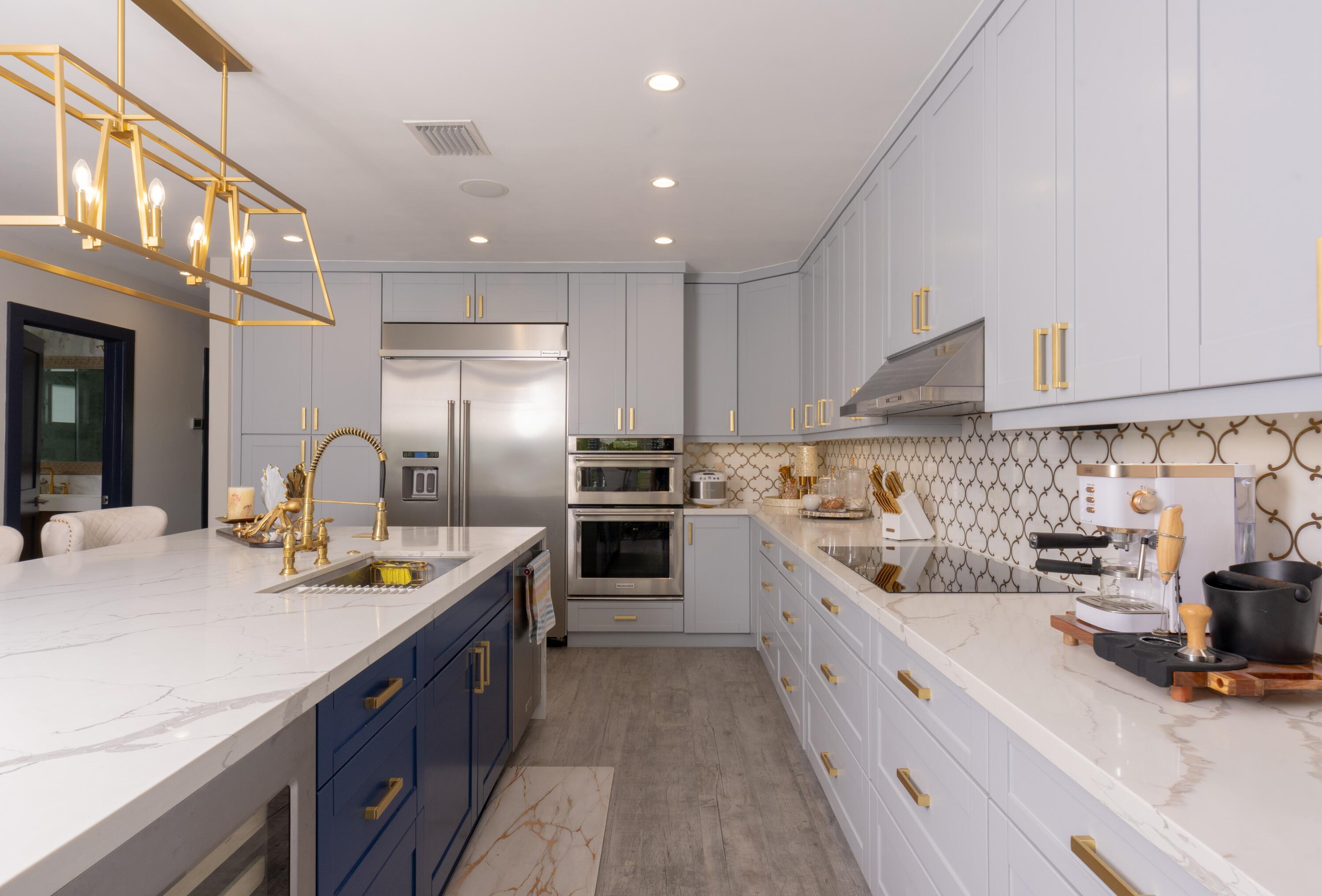 475 Bahia Honda Road Key Largo, FL 33037 - Photo 89 of 134 a kitchen with stainless steel appliances granite countertop a sink stove and refrigerator