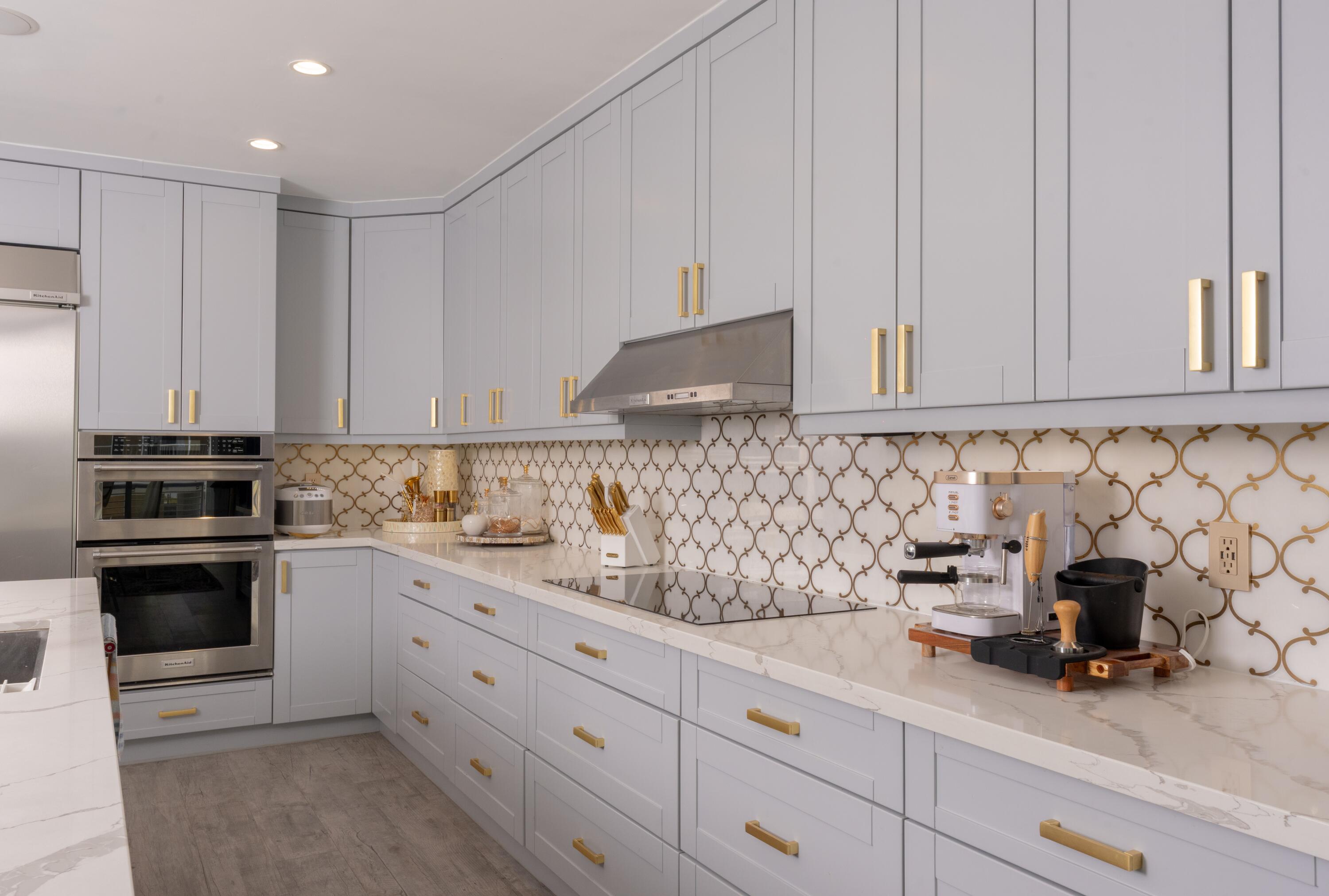 475 Bahia Honda Road Key Largo, FL 33037 - Photo 90 of 134 a kitchen with white cabinets and appliances