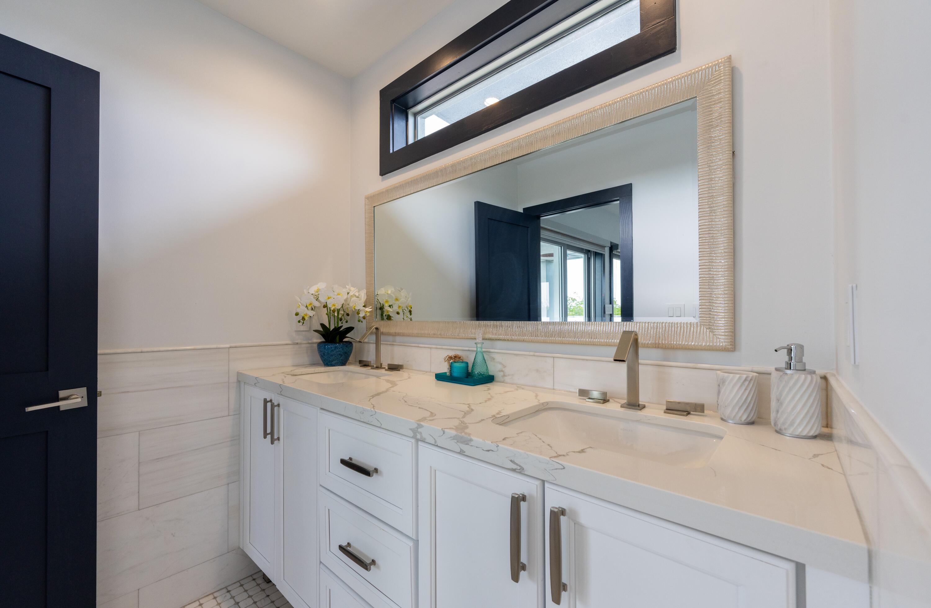 475 Bahia Honda Road Key Largo, FL 33037 - Photo 95 of 134 a bathroom with a sink and a mirror