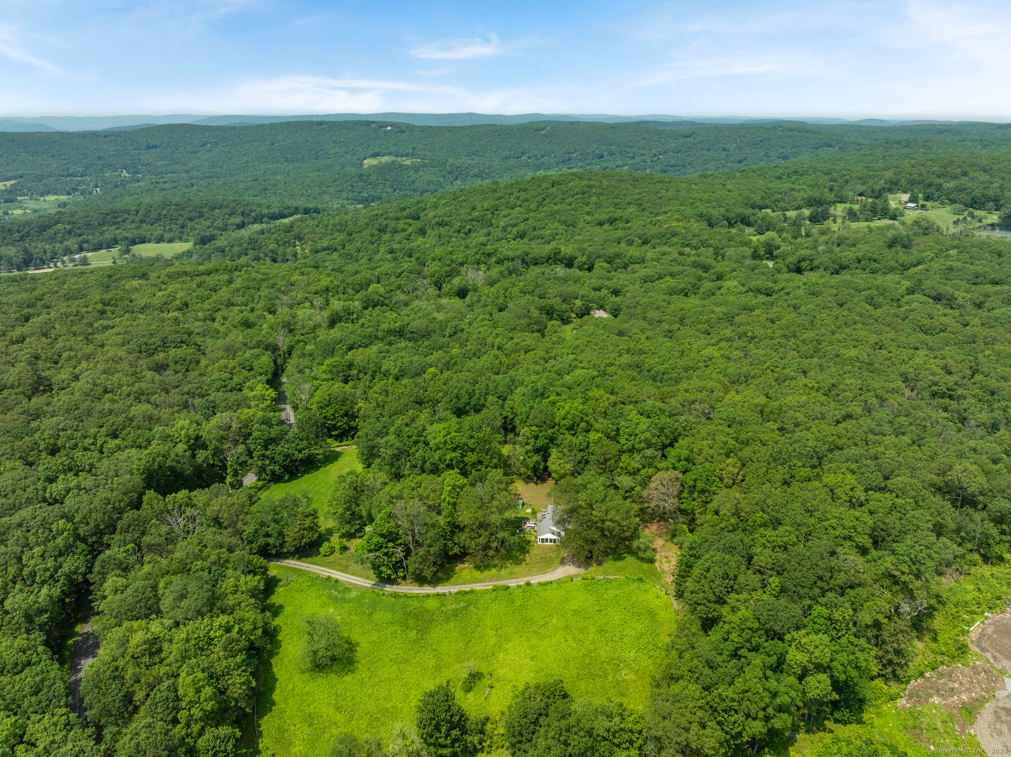 25 Mountain Lake Road Warren, CT 06777 - Photo 8 of 16 a view of yard with green space
