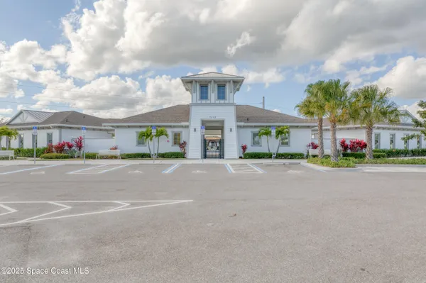 a view of a swimming pool with a yard