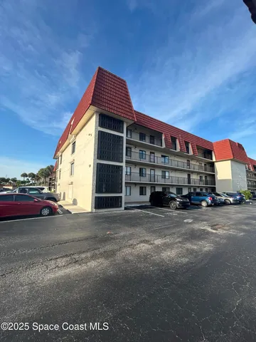 a view of a house with a street