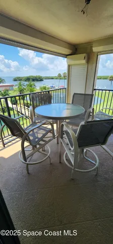 a view of a lake with a yard