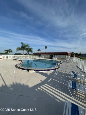 a view of a terrace with chairs
