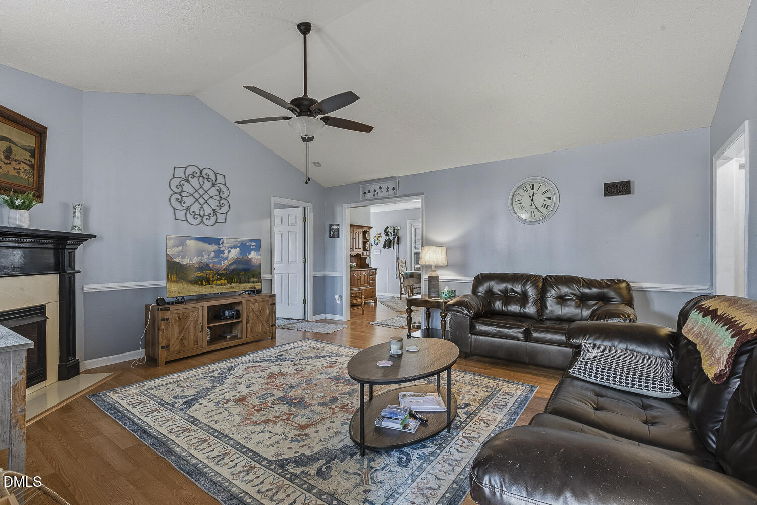 333 Greenleaf Road Angier, NC 27501 - Photo 8 of 42 a living room with furniture and a fireplace