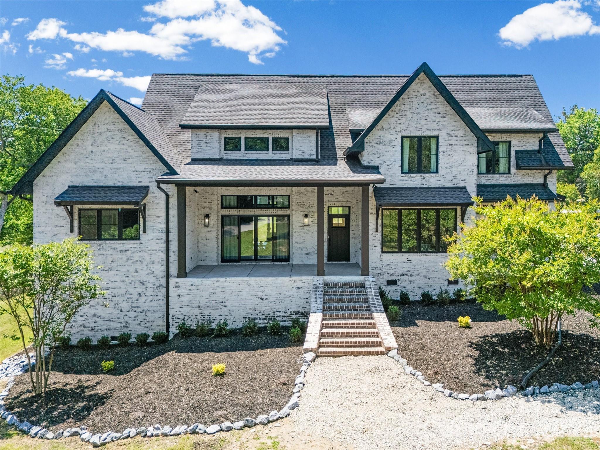 5438 Ralph Harper Lane Clover, SC 29710 - Photo 1 of 28 a front view of a house with garden