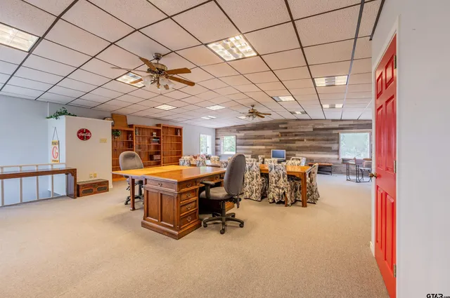 a room with furniture and air hockey table