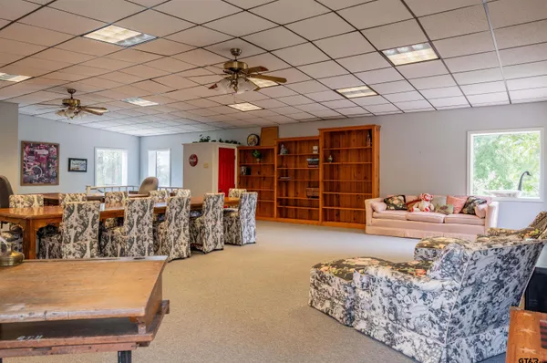 a view of a livingroom with furniture