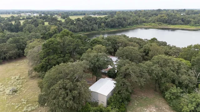 an aerial view of mountain with lake view