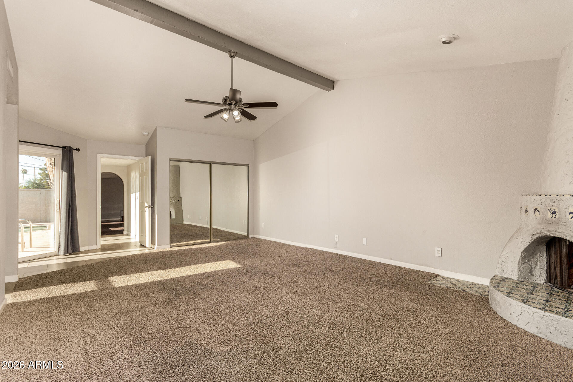 1708 North Daffodil Street Tempe, AZ 85288 - Photo 19 of 34 a view of livingroom with fireplace and ceiling fan