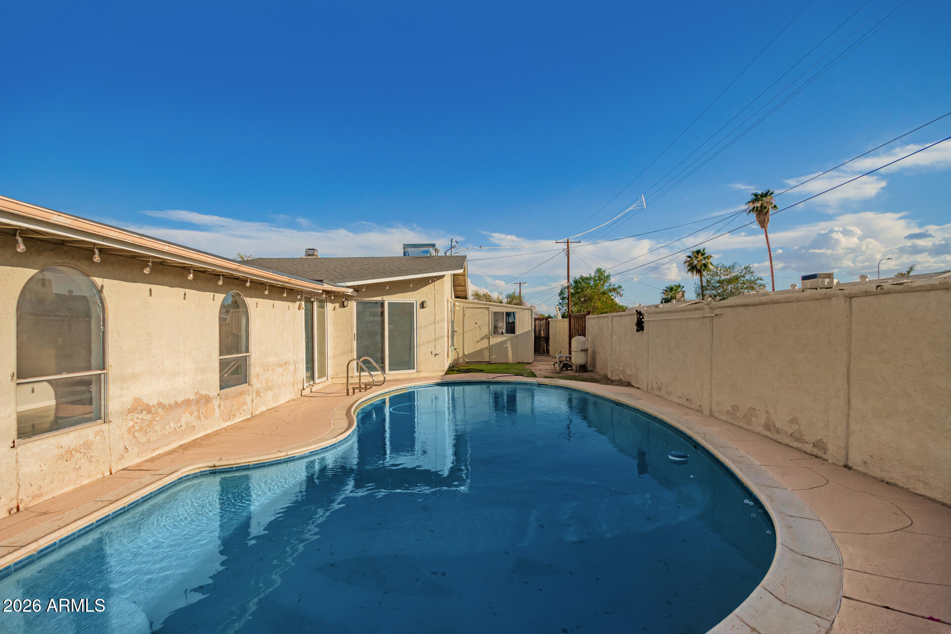 1708 North Daffodil Street Tempe, AZ 85288 - Photo 33 of 34 a view of a living room with a swimming pool