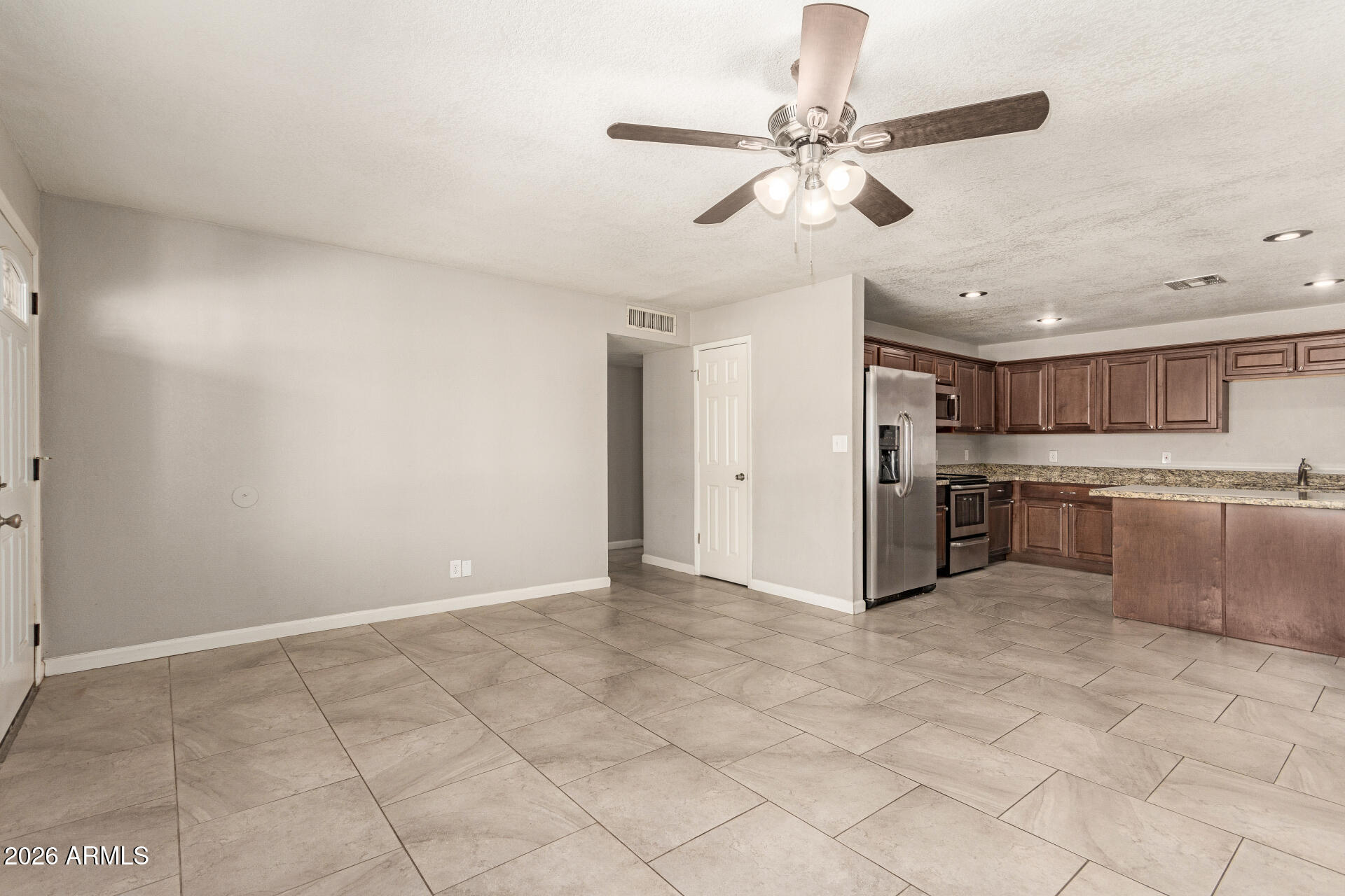 1708 North Daffodil Street Tempe, AZ 85288 - Photo 5 of 34 a view of a kitchen with a sink and a window