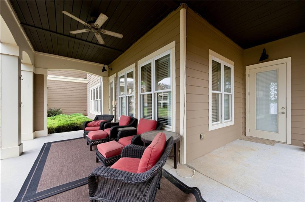 117 South Bay Road, Unit 402 Eatonton, GA 31024 - Photo 36 of 48 a living room with furniture and a large window