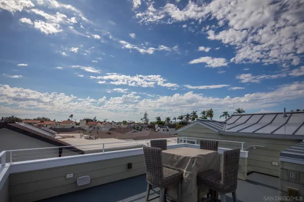 a view of a terrace with furniture