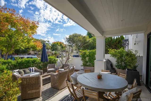 a outdoor space with tables and chairs
