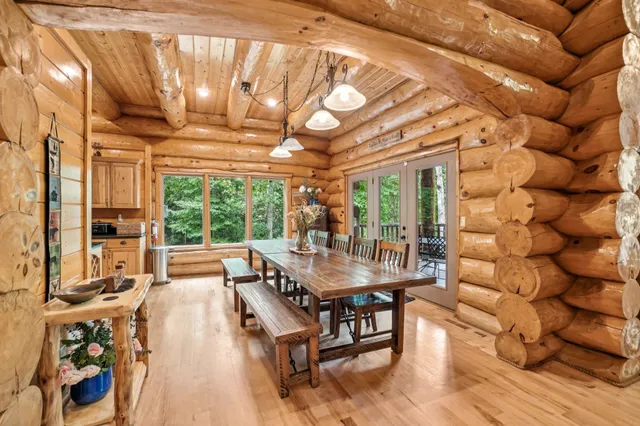 a kitchen with granite countertop a stove and a sink