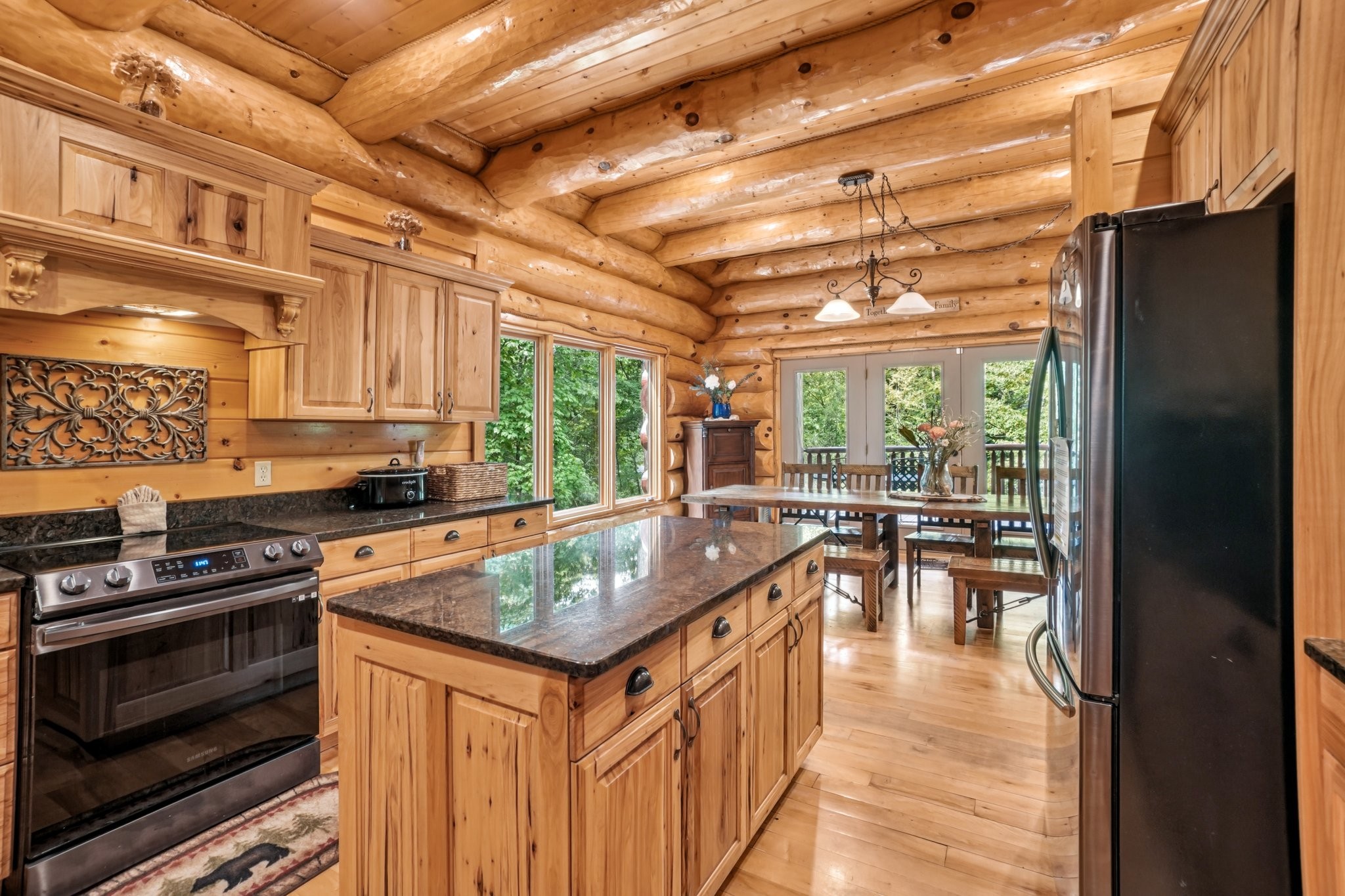 641 Pinnacle Vista Road Gatlinburg, TN 37738 - Photo 17 of 68 a kitchen with granite countertop a stove and a sink