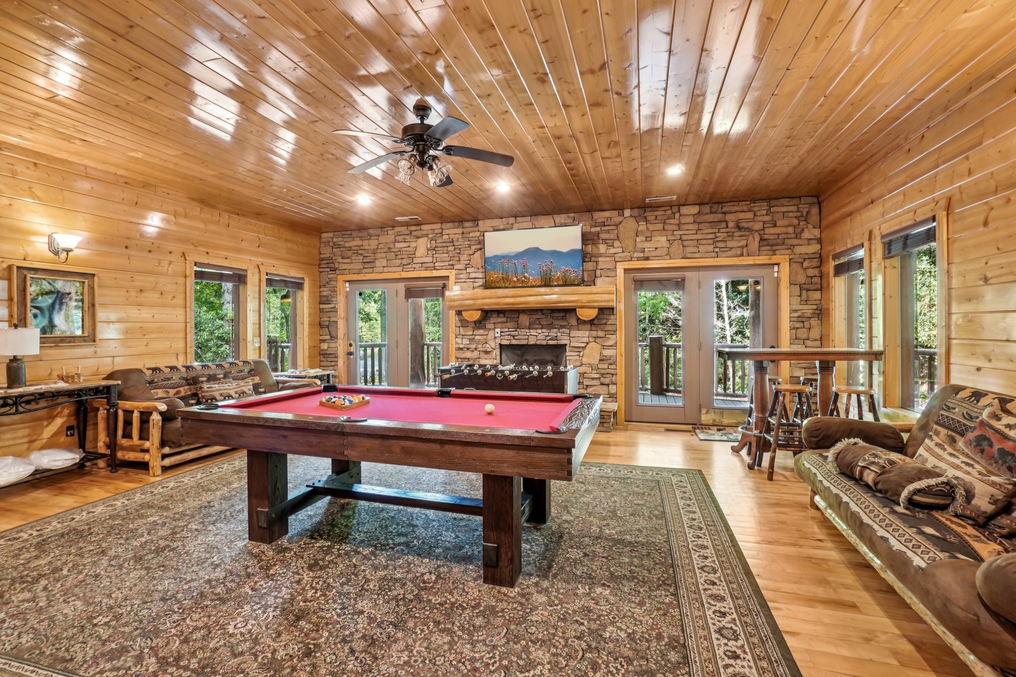 641 Pinnacle Vista Road Gatlinburg, TN 37738 - Photo 36 of 68 a room with pool table windows and wooden floor