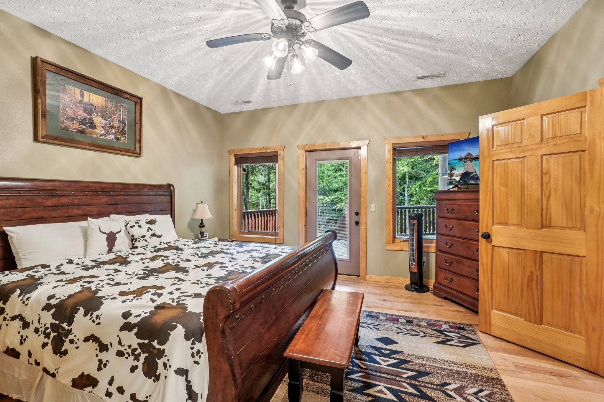 641 Pinnacle Vista Road Gatlinburg, TN 37738 - Photo 42 of 68 a bedroom with a bed and a dresser