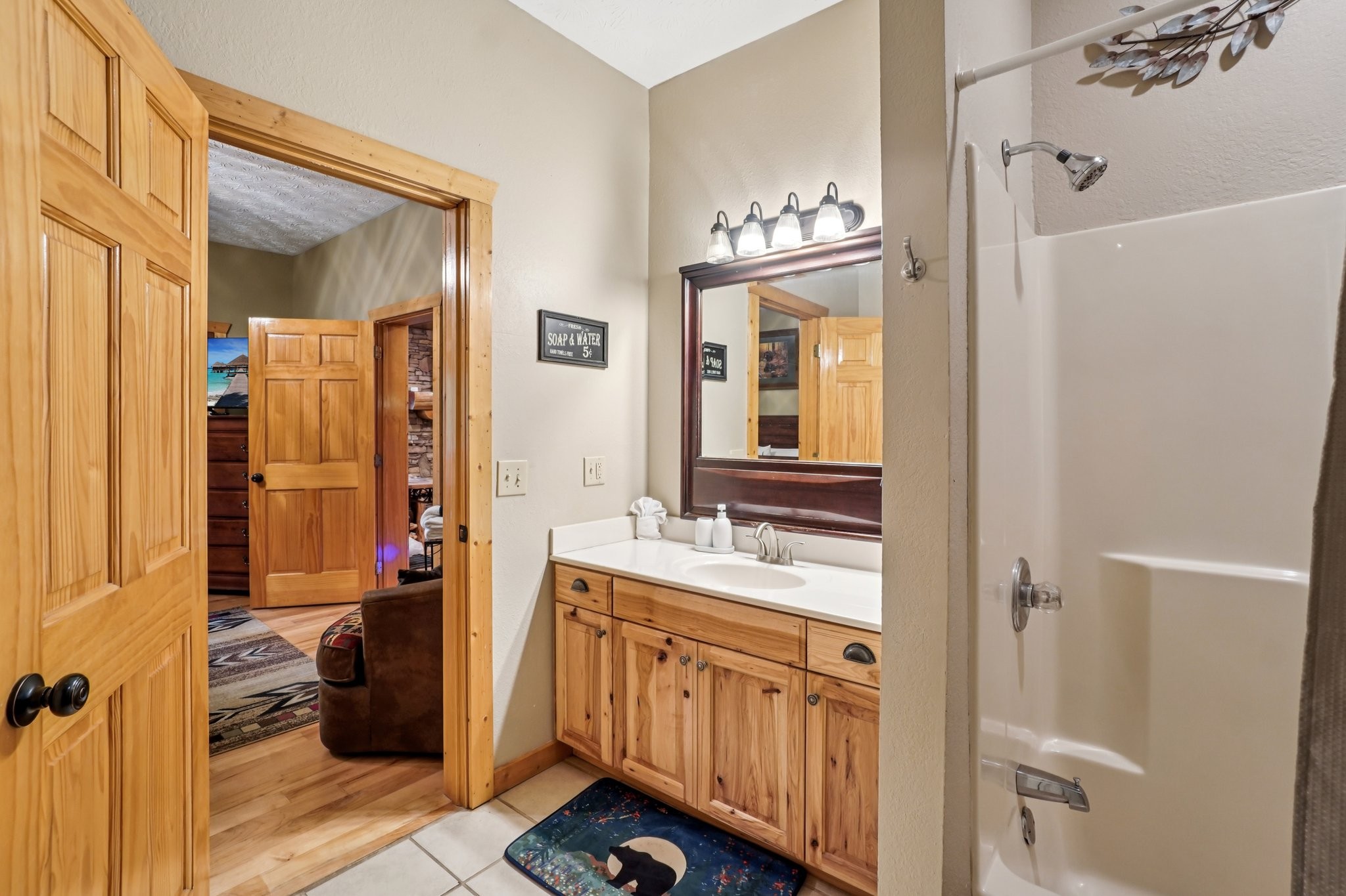641 Pinnacle Vista Road Gatlinburg, TN 37738 - Photo 43 of 68 a bathroom with a sink a toilet and shower