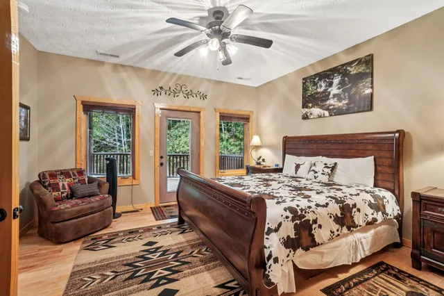 a view of a big yard with lots of green space