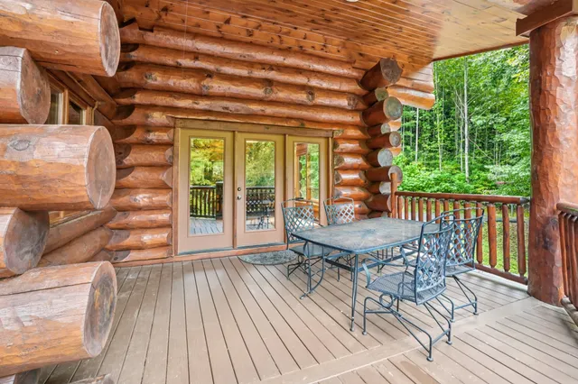 a view of a big yard with lots of bushes