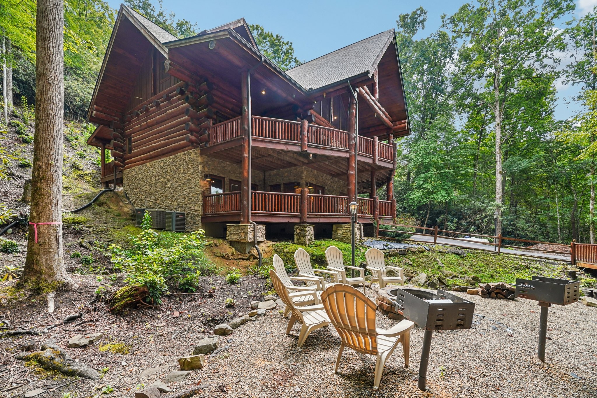 641 Pinnacle Vista Road Gatlinburg, TN 37738 - Photo 58 of 68 a view of a house with backyard and sitting area