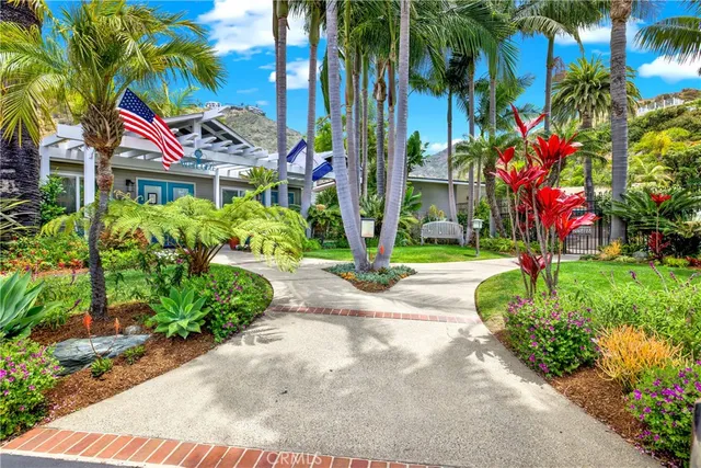 an aerial view of a house with a garden
