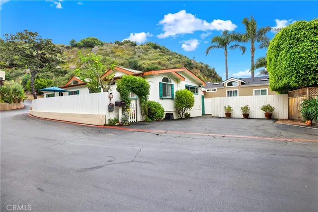 an aerial view of a house with a garden