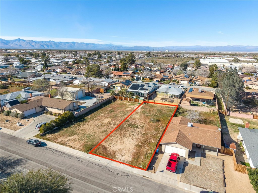0 Garis Avenue Ridgecrest, CA 93555 - Photo 1 of 12 an aerial view of residential houses with outdoor space
