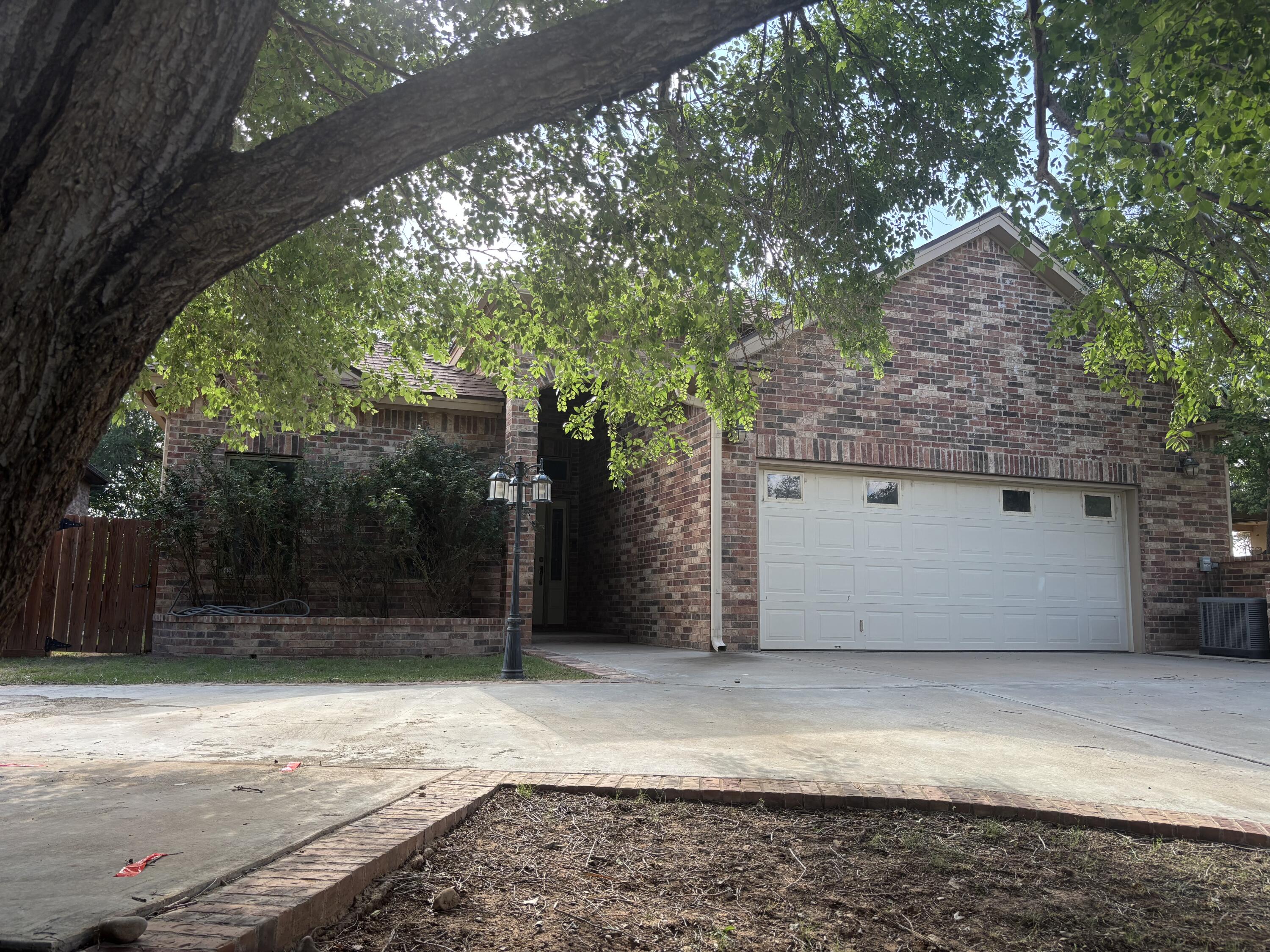 33 West Lakeshore Drive Ransom Canyon, TX 79366 - Photo 45 of 48 a house view with a backyard
