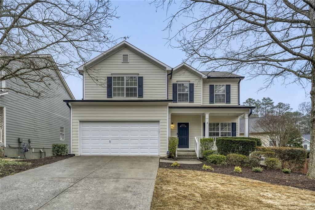 133 Whitfield Way Woodstock, GA 30188 - Photo 1 of 1 a front view of a house with garden