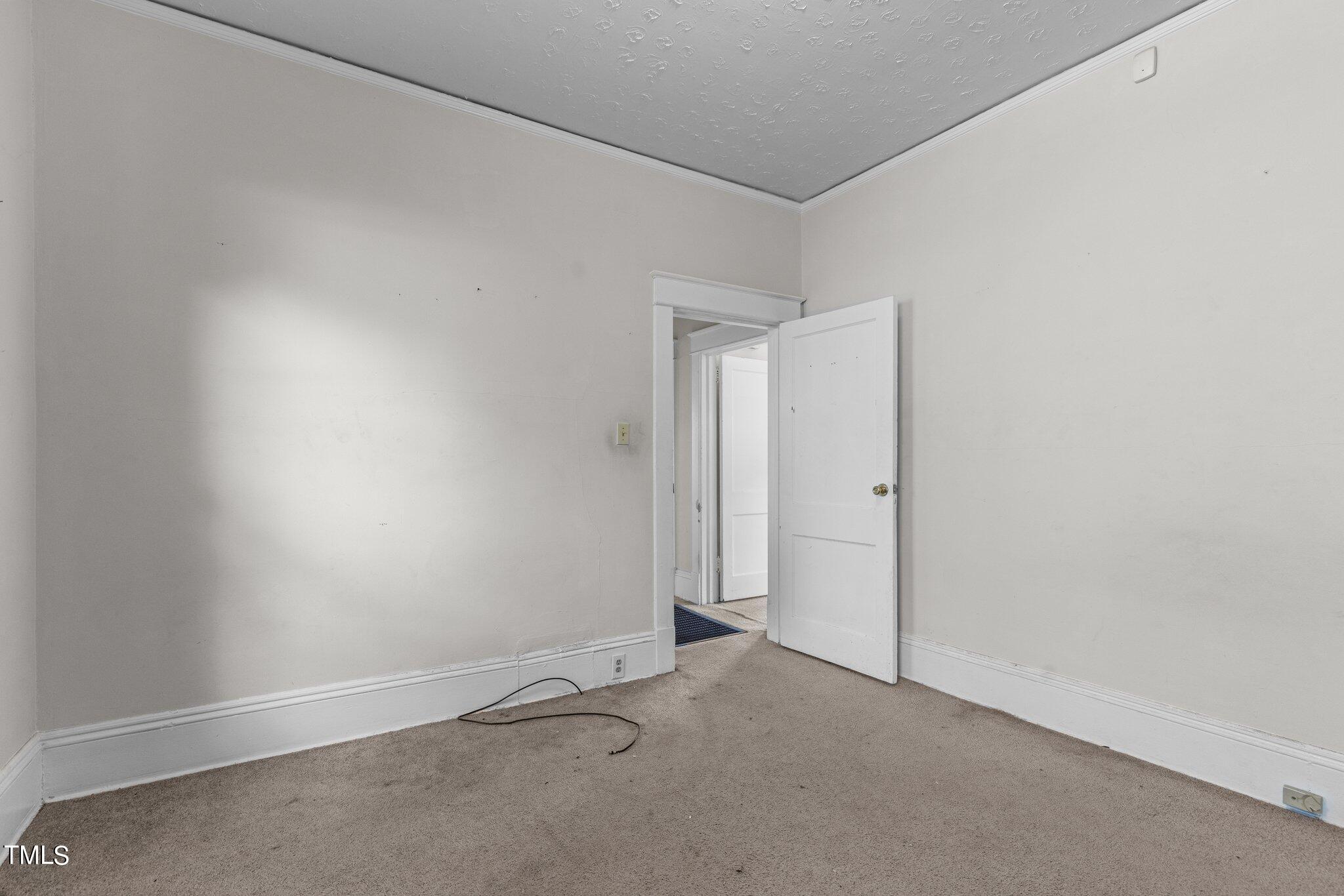 810 East Edenton Street Raleigh, NC 27601 - Photo 14 of 32 an empty room with an entryway