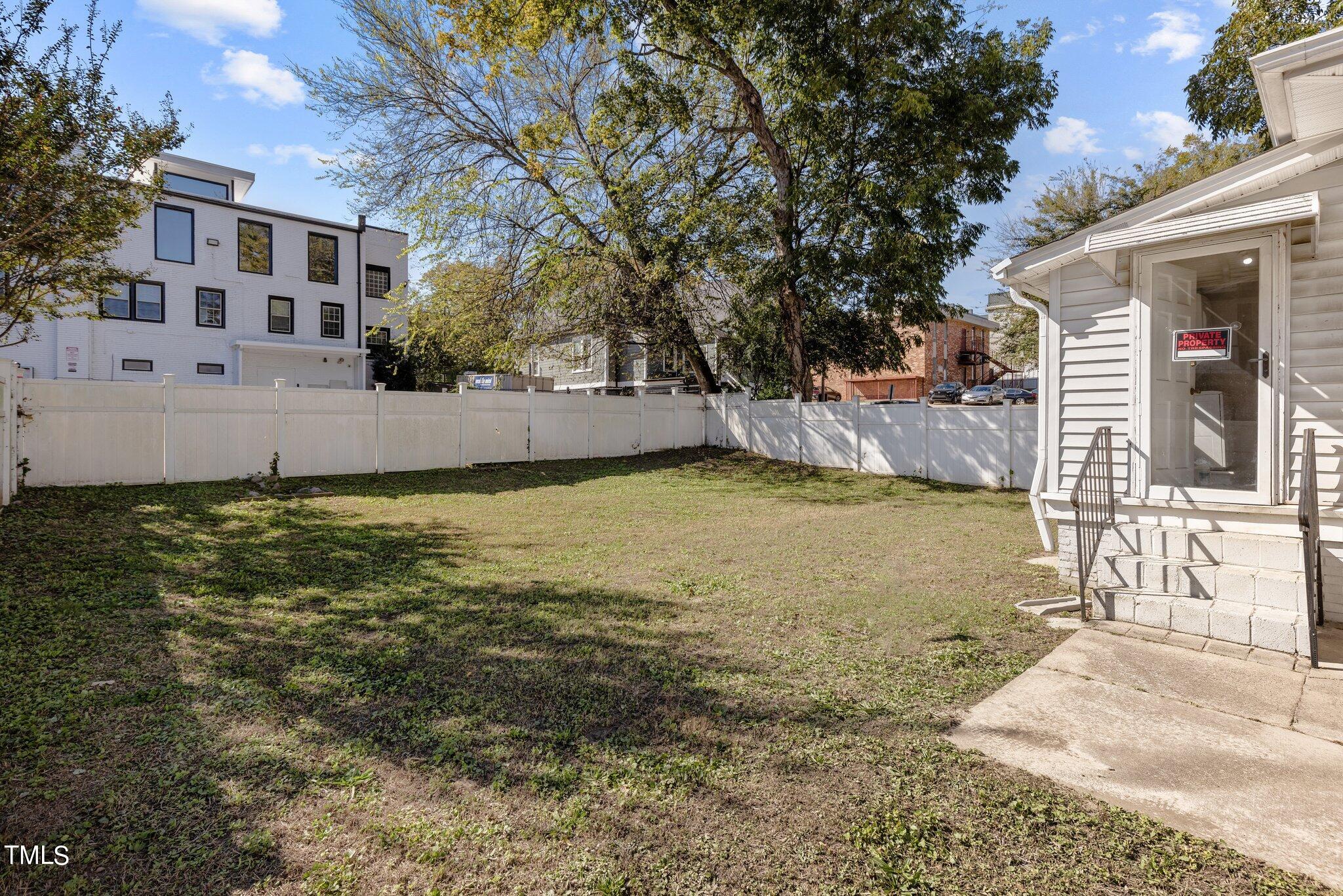 810 East Edenton Street Raleigh, NC 27601 - Photo 20 of 32 a view of a house with a yard