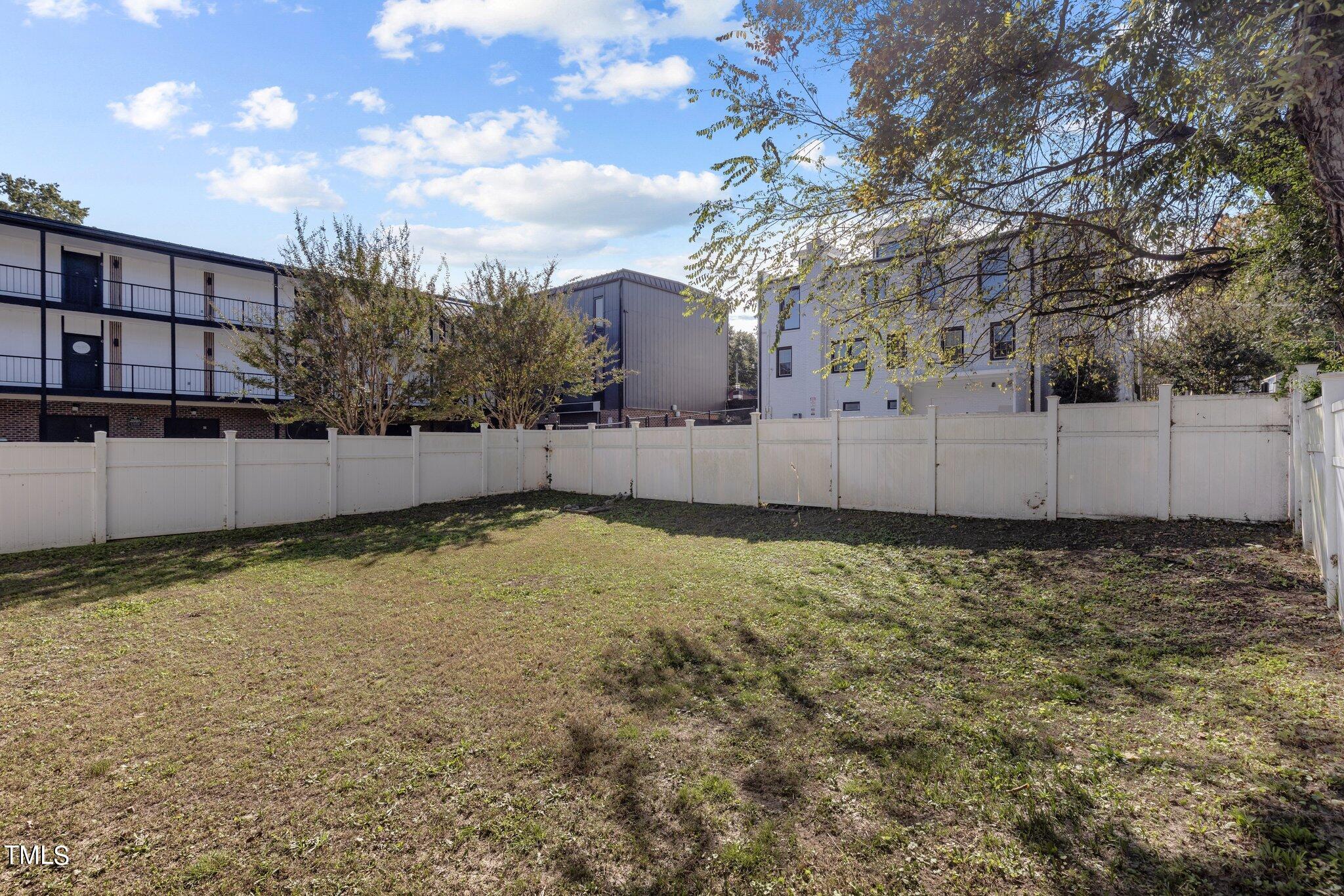 810 East Edenton Street Raleigh, NC 27601 - Photo 23 of 32 a backyard of a house and trees