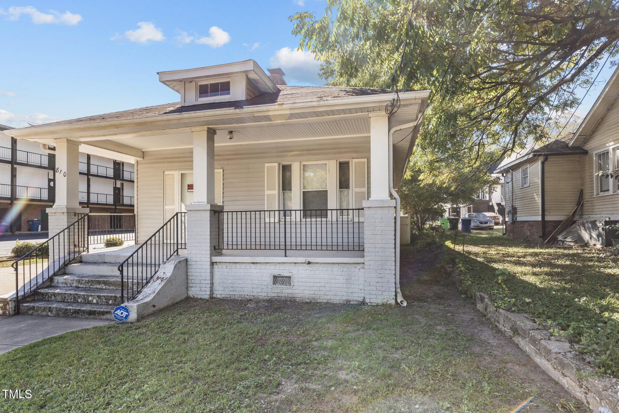 810 East Edenton Street Raleigh, NC 27601 - Photo 26 of 32 a view of a house with backyard and porch