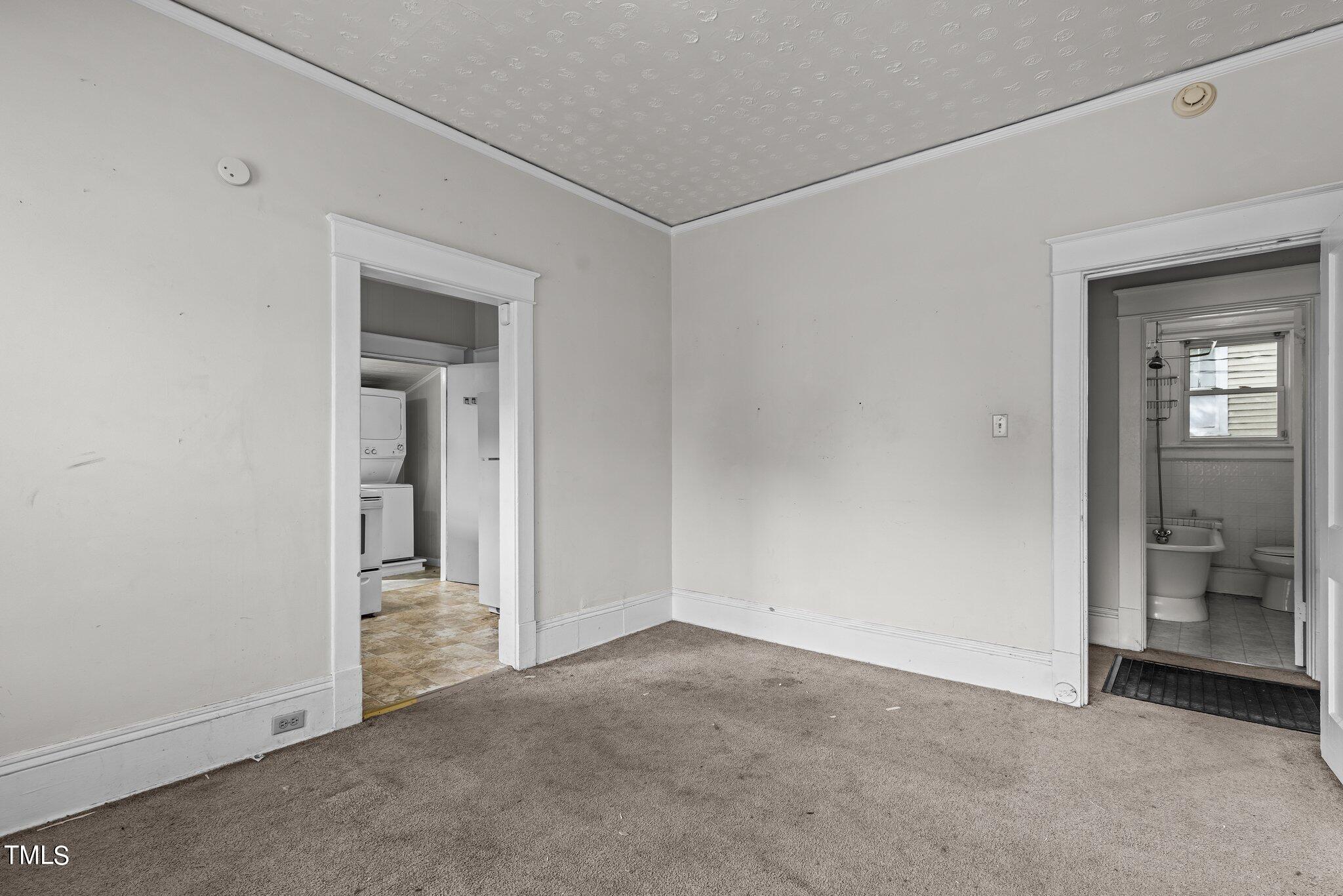 810 East Edenton Street Raleigh, NC 27601 - Photo 6 of 32 a view of an empty room and a window