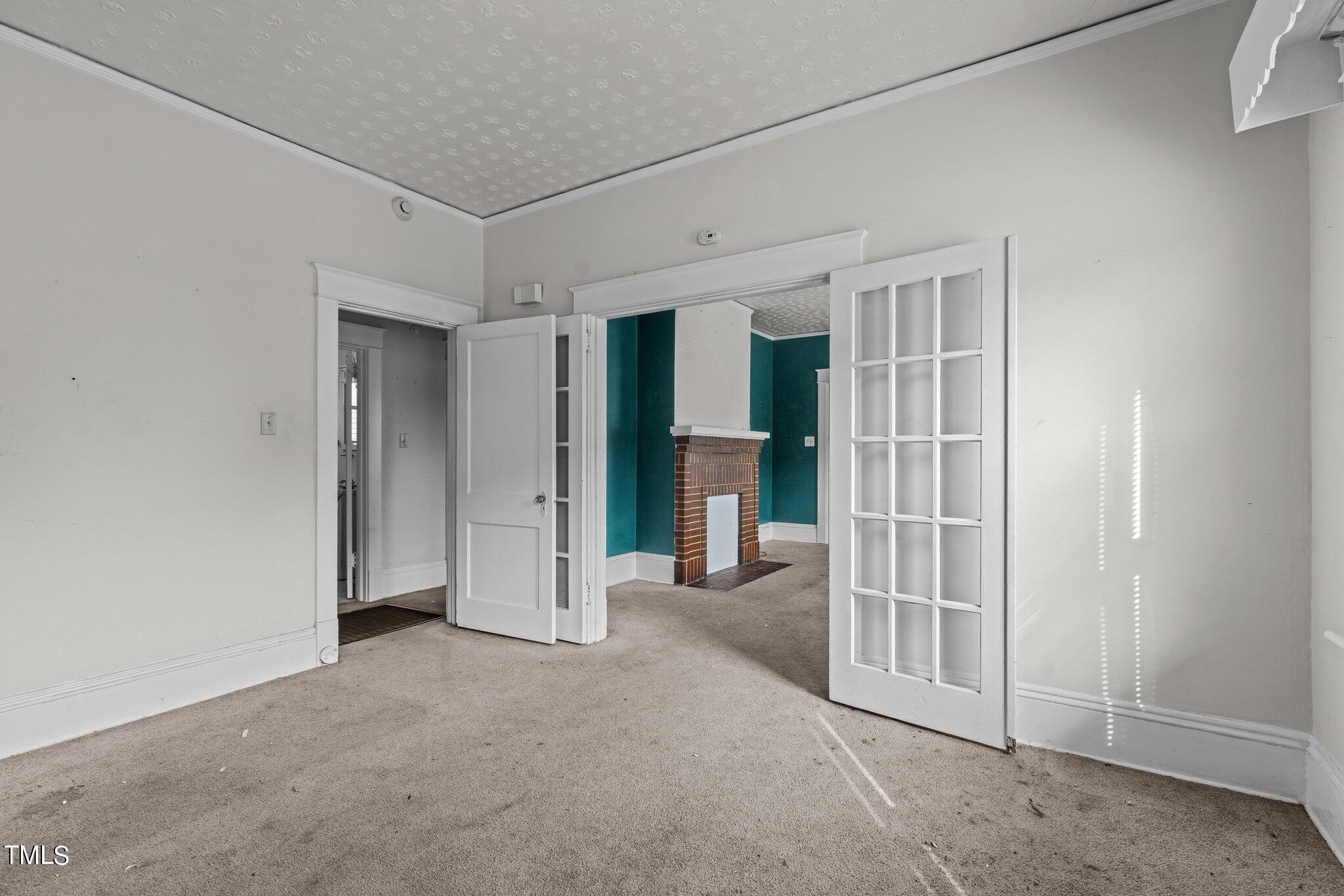 810 East Edenton Street Raleigh, NC 27601 - Photo 7 of 32 a view of a room with walk in closet