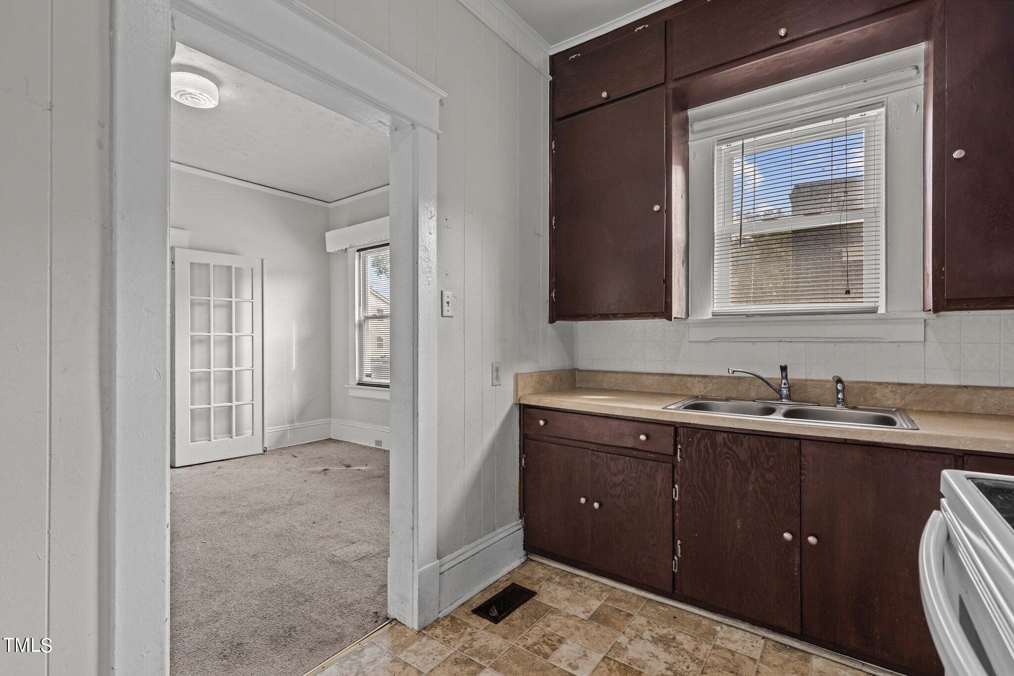 810 East Edenton Street Raleigh, NC 27601 - Photo 10 of 32 a bathroom with a sink and a mirror