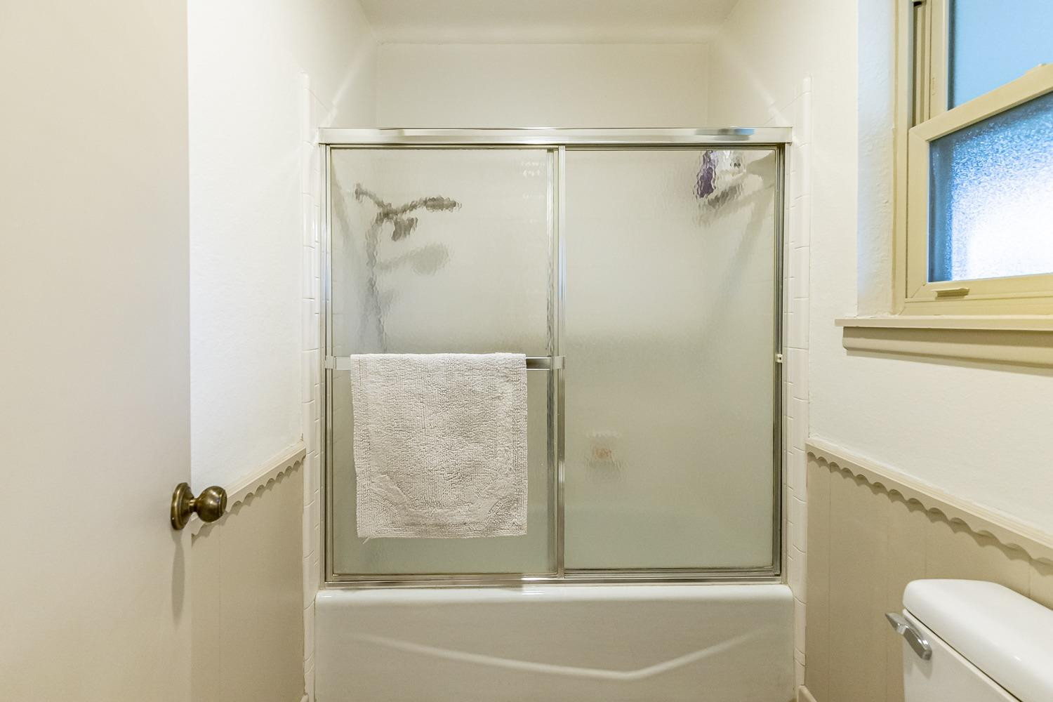 4602 63rd Street Lubbock, TX 79414 - Photo 19 of 37 a bathroom with a shower