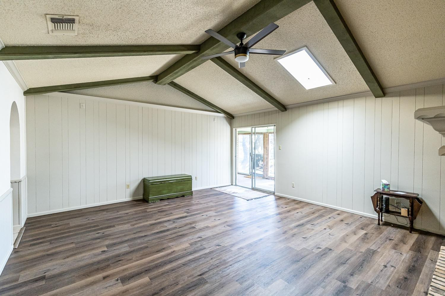 4602 63rd Street Lubbock, TX 79414 - Photo 10 of 37 a room with wooden floor and a window