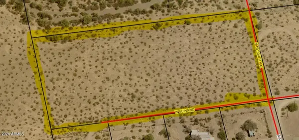 a view of wooden floor with a window