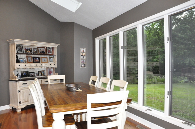 2048 North 3650th Road Serena, IL 60549 - Photo 15 of 82 a view of a dining room with furniture large windows and wooden floor