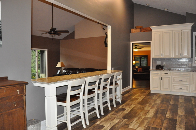 2048 North 3650th Road Serena, IL 60549 - Photo 23 of 82 a kitchen with stainless steel appliances kitchen island granite countertop a refrigerator and a stove top oven