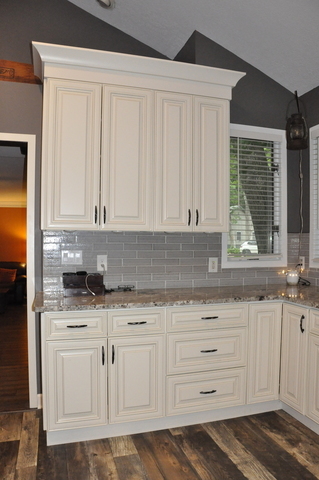 2048 North 3650th Road Serena, IL 60549 - Photo 25 of 82 a kitchen with granite countertop white cabinets and sink