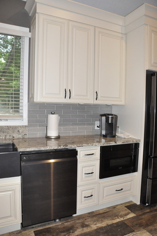 2048 North 3650th Road Serena, IL 60549 - Photo 27 of 82 a kitchen with granite countertop white cabinets and white appliances