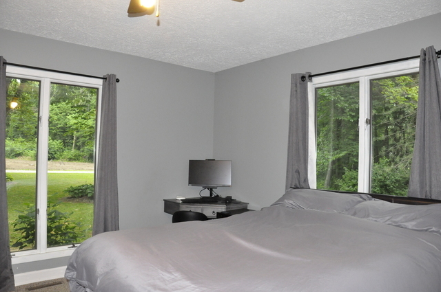 2048 North 3650th Road Serena, IL 60549 - Photo 35 of 82 a bedroom with a bed and large windows