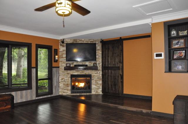 2048 North 3650th Road Serena, IL 60549 - Photo 39 of 82 a view of an empty room with wooden floor and a fireplace