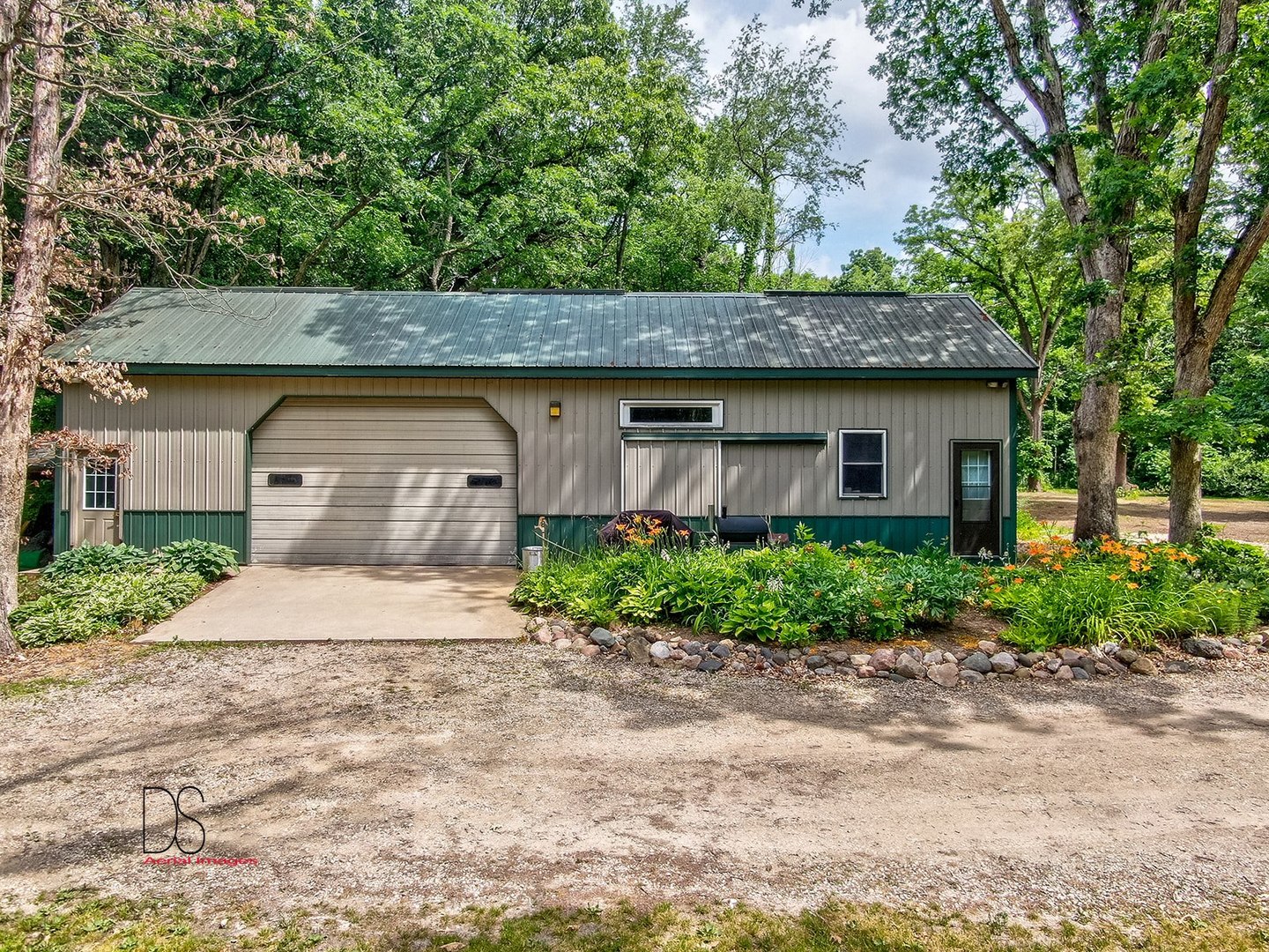 2048 North 3650th Road Serena, IL 60549 - Photo 65 of 82 a front view of a house with a garden